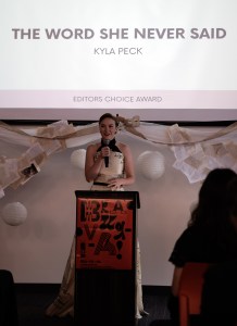 "The Word She Never Said" by Kayla Peck, Woman at podium